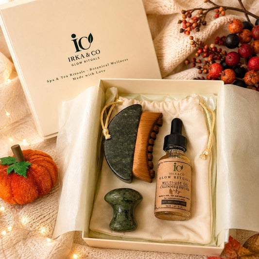Jade Ritual Set gift box with the IRKA & CO branded lid, styled with autumn berries and a felt pumpkin