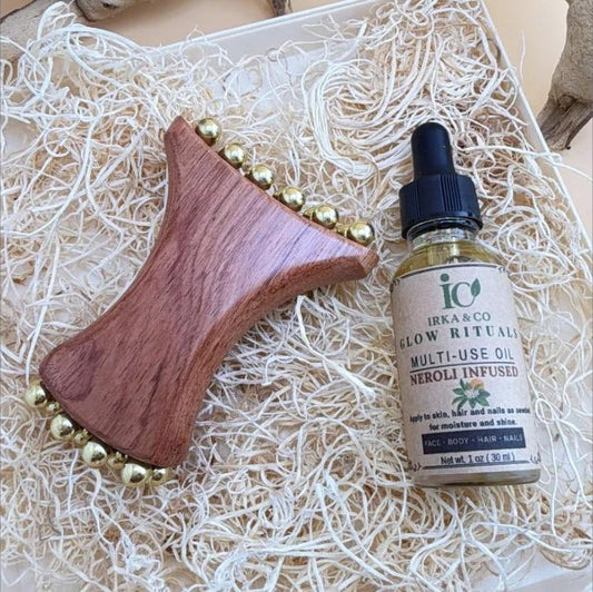 Handcrafted wood and brass gua sha for facial sculpting