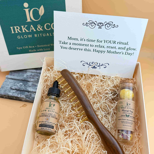 Ebony and brass scalp massage comb, botanical infused oil and blooming tea from the Irka & Co Scalp Revitalization Ritual Set