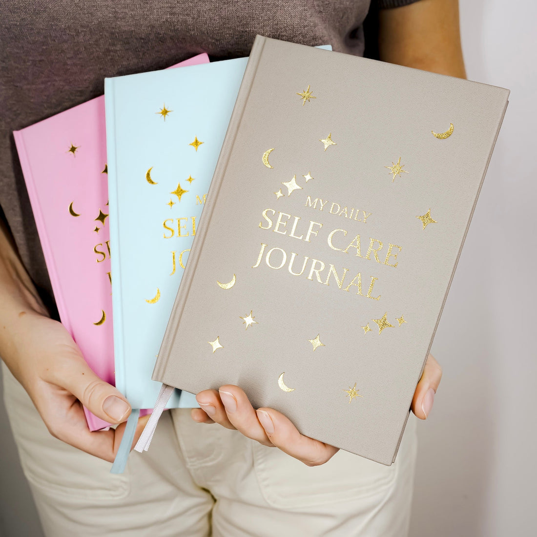 A5 guided self-care journal with gold-foil celestial hardcover, rose gold pen and sticker sheets from Irka & Co