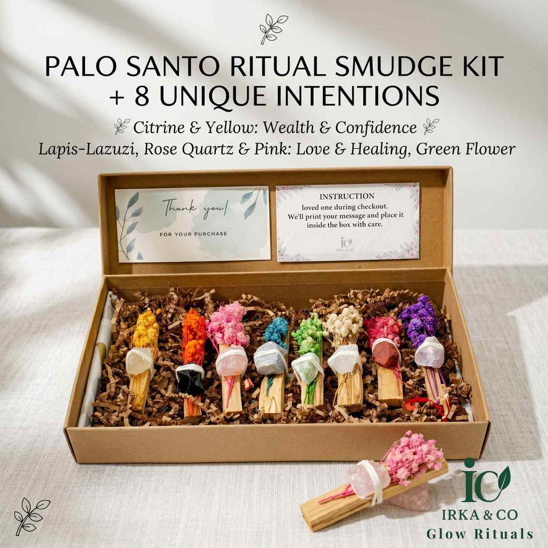 Palo santo sticks paired with raw intention crystals and dried baby's breath in the Irka & Co ritual smudge kit