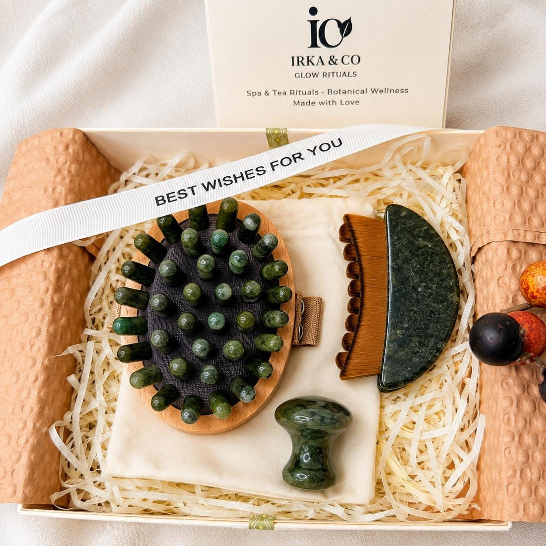 Three-piece jade massage set with body brush, gua sha comb and mushroom massager from Irka & Co