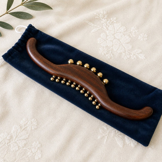 Wood and brass back massage wand with S-curve design for spine, neck and legs, by Irka & Co