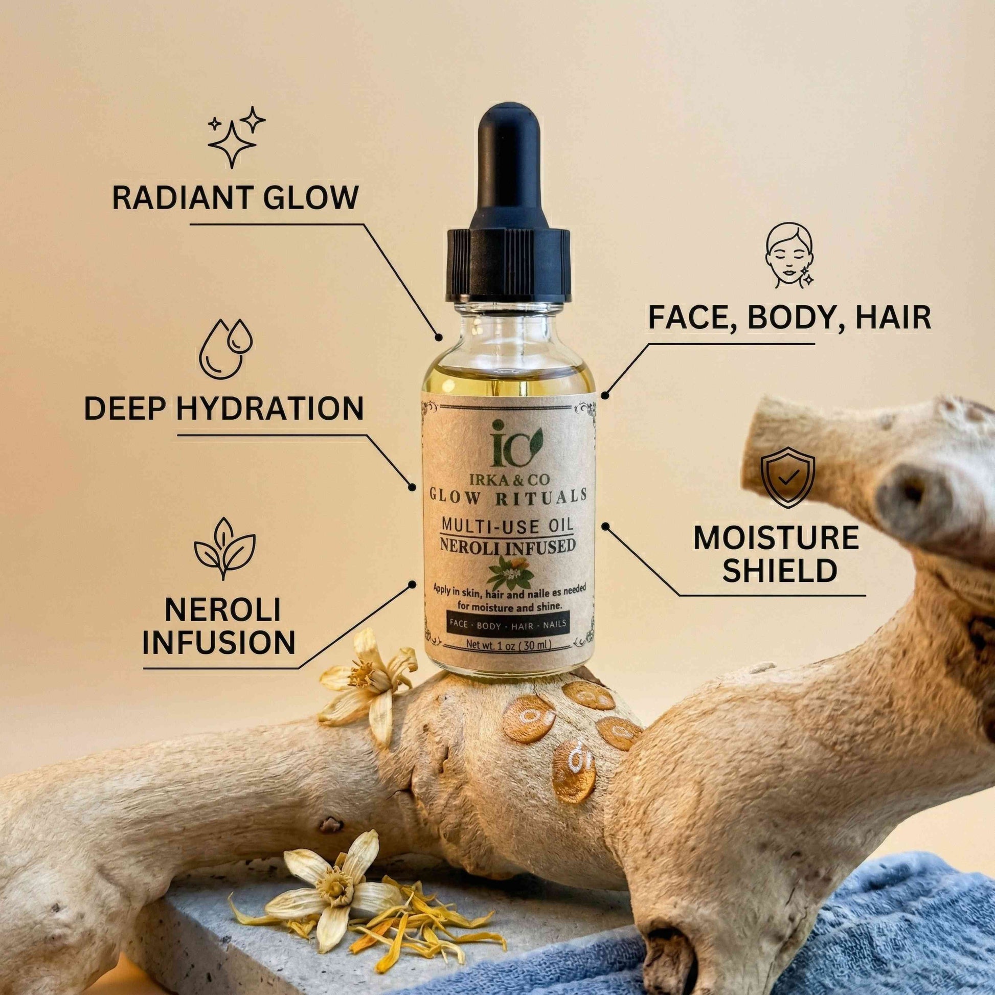 Bottle of Irka & Co multi-use botanical oil with neroli infusion resting on driftwood, with dried botanical flowers, labeled for radiant glow, deep hydration, and face, body, and hair use