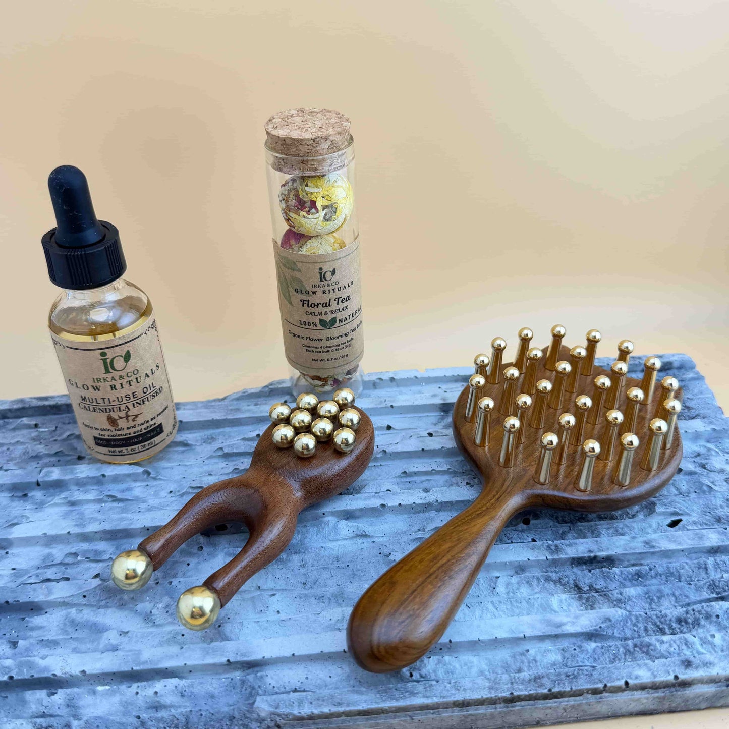 Copper massage tools with body oil and blooming tea set for self care and stress relief