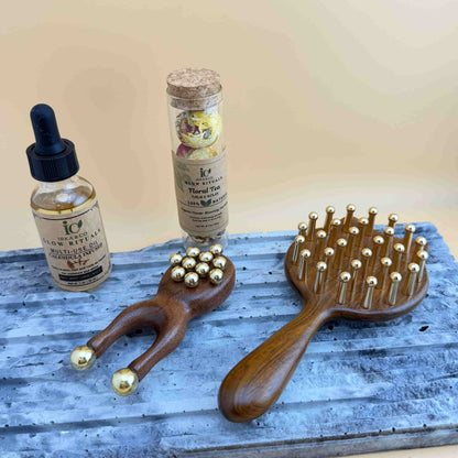 Copper massage tools with body oil and blooming tea set for self care and stress relief
