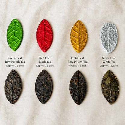 Chart of the four tea varieties: green and gold raw pu-erh leaves, red black tea and silver white tea, about 7 grams each