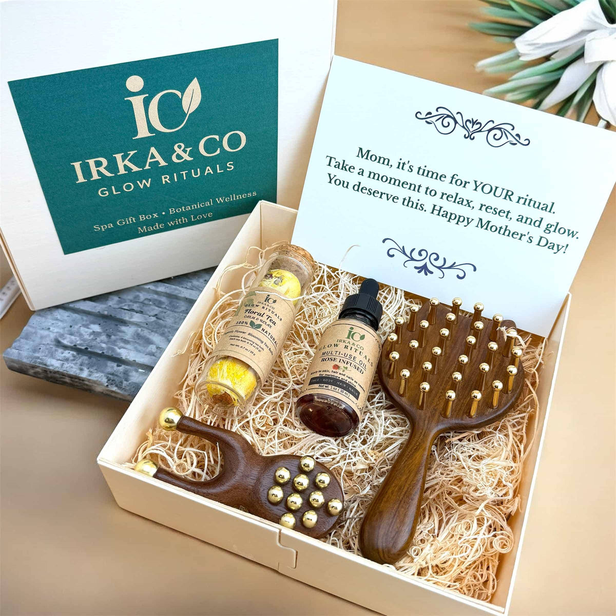 Brass massage and tea ritual gift box with frog tool, cat comb, botanical oil and blooming tea