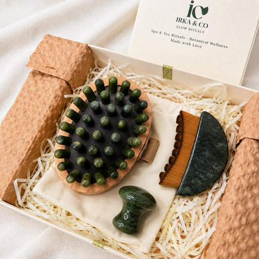 Jade Body & Face Massage Ritual Set showing the jade body brush, gua sha, and mushroom roller together in the open gift box