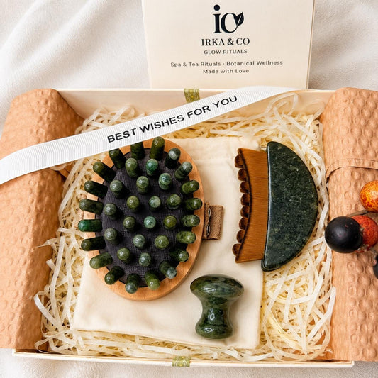 Jade Body & Face Massage Ritual Set with jade body brush, gua sha, and mushroom roller in an IRKA & CO gift box with a Best Wishes For You ribbon