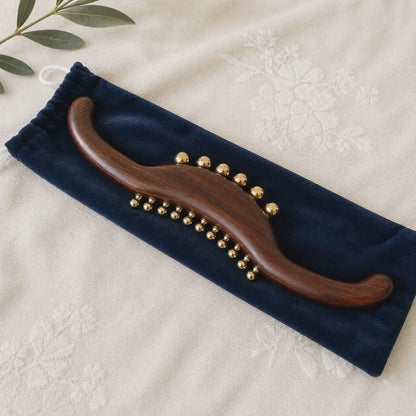 Full Body Lymphatic Drainage Massage Wand in use, demonstrating the 14-inch wood and brass wand for back, neck and leg massage