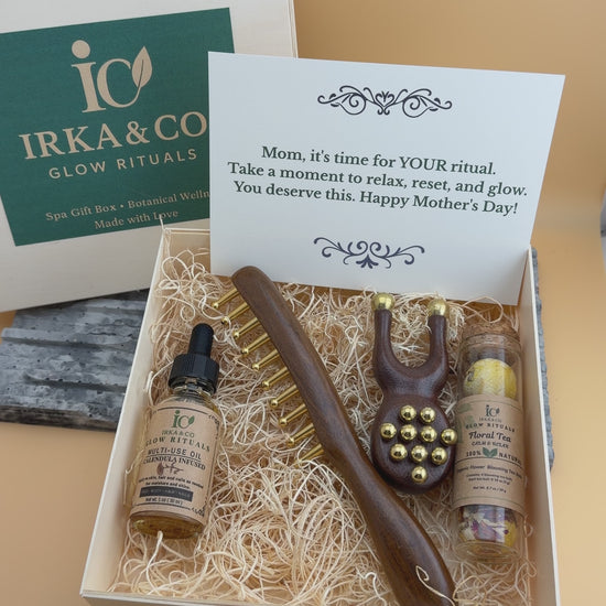 Gift for mom wellness box with copper massage tools, botanical oil and blooming tea set