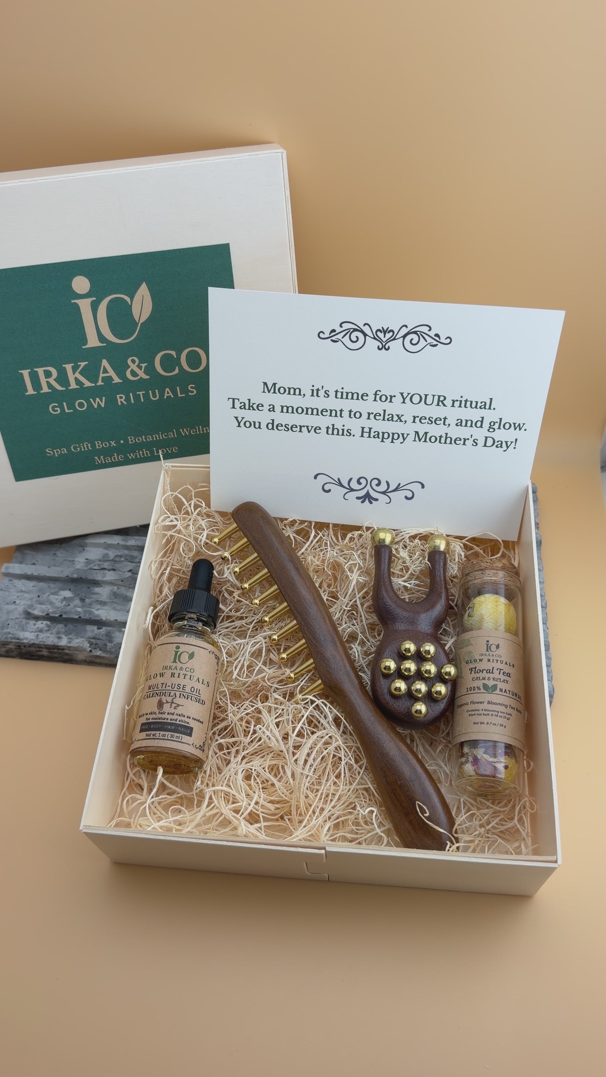 Gift for mom wellness box with copper massage tools, botanical oil and blooming tea set