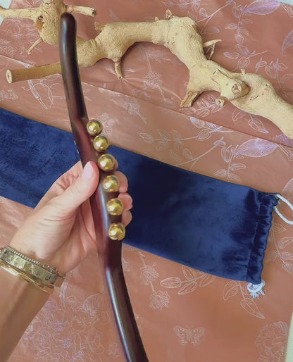 Close-up of the 17 solid brass beads on the Full Body Lymphatic Drainage Massage Wand, showing the two bead sizes for different massage intensities